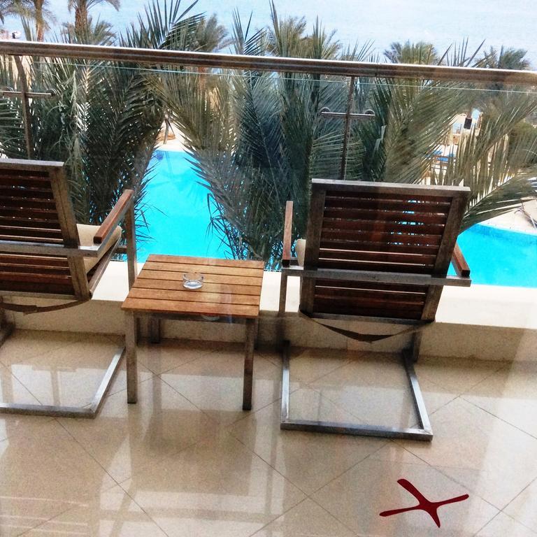 Xperience Sea Breeze Resort (Adults Only) Шарм-еш-Шейх Екстер'єр фото A balcony at the hotel