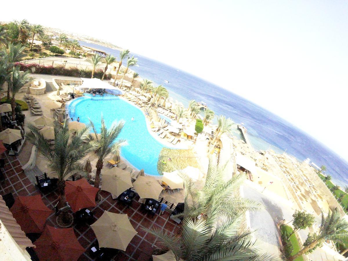 Xperience Sea Breeze Resort (Adults Only) Шарм-еш-Шейх Екстер'єр фото View of the pool at the Hilton Sharm El Sheikh