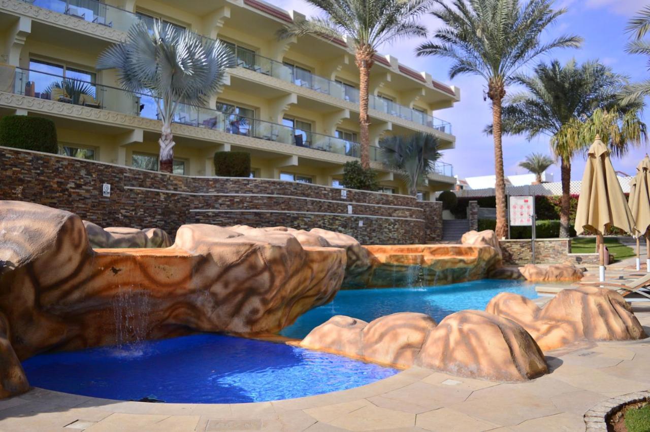 Xperience Sea Breeze Resort (Adults Only) Шарм-еш-Шейх Екстер'єр фото The pool at the Hilton Sharm El Sheikh